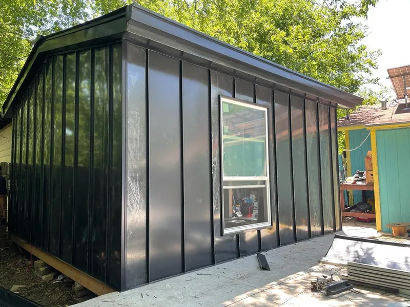 Black standing seam metal wall panels for Roof Inspection in Nocatee