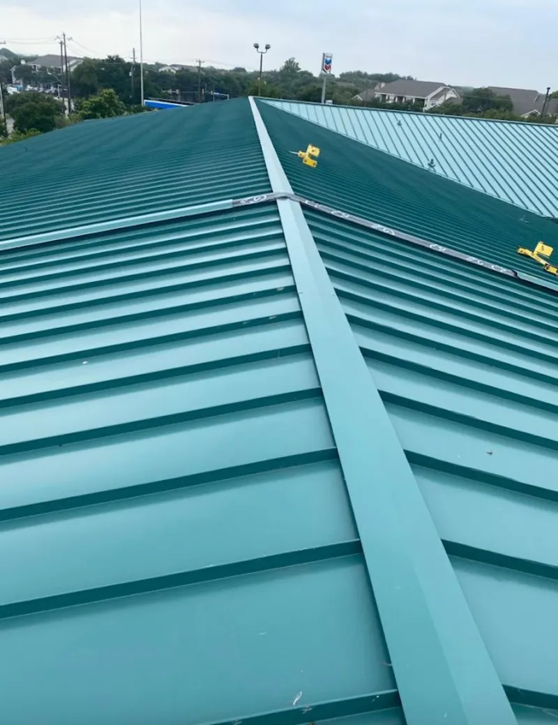 Green commercial metal roof ridge and valley for Metal Roof Repair in Nocatee